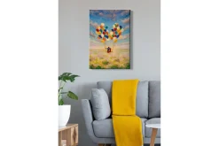 Canvastavla - Par med ballonger som svävar över en blomstrande äng
