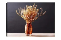 Canvastavla - Torkade blommor i en elegant glasvas