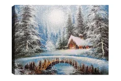 Canvastavla - Vinterlandskap med en stuga och snöklädda träd