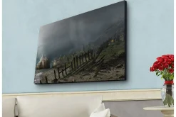 Canvastavla med LED-belysning - Dramatiskt landskap med stormiga moln och en kustlinje