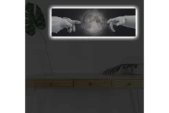 Canvastavla med LED-belysning - Astronauthänder som sträcker sig mot månen