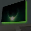 Canvastavla med LED-belysning - Storslagen planet med ljusstrålar som sträcker sig ut i rymden