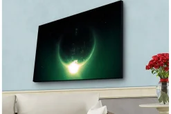 Canvastavla med LED-belysning - Storslagen planet med ljusstrålar som sträcker sig ut i rymden