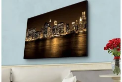 Canvastavla med LED-belysning - Storslagen stadsbild av en skyline med upplysta skyskrapor