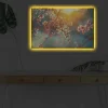 Canvastavla med LED-belysning - Blommande grenar i mjukt ljus