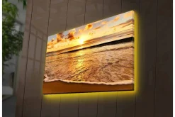 Canvastavla med LED-belysning - Solnedgång över havet med reflektioner på vattnet