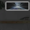 Canvastavla med LED-belysning - Jorden sedd från rymden med strålar av ljus som bryter genom atmosfären