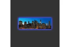 Canvastavla med LED-belysning - Stadssilhuett av New York i skymning