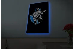 Canvastavla med LED-belysning - Astronaut som spelar gitarr i rymden