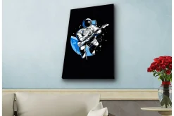 Canvastavla med LED-belysning - Astronaut som spelar gitarr i rymden