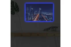 Canvastavla med LED-belysning - Nattlig stadssilhuett med upplysta skyskrapor
