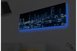 Canvastavla med LED-belysning - Nattlig stadssilhuett med upplysta skyskrapor