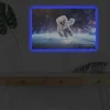 Canvastavla med LED-belysning - Astronaut som svävar i rymden över jorden