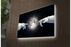Canvastavla med LED-belysning - Astronauthänder som sträcker sig mot månen