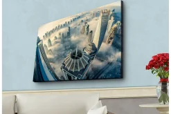 Canvastavla med LED-belysning - Futuristisk stadslandskap med höga skyskrapor i dimma
