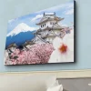 Canvastavla med LED-belysning - Vacker japansk slott med körsbärsblommor och Mount Fuji i bakgrunden