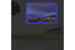 Canvastavla med LED-belysning - Dramatiskt åskväder över en stadssilhuett
