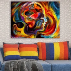 Canvastavla 70x100 cm - Färgstark och abstrakt skildring av en människas profil med inslag av en fjäril som symboliserar transformation och frihet