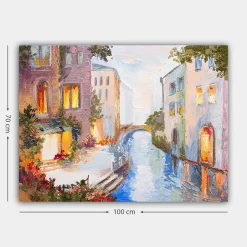 Canvastavla 70x100 cm - Pittoresk kanal med färgglada hus och en bro som speglas i vattnet
