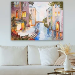 Canvastavla 70x100 cm - Pittoresk kanal med färgglada hus och en bro som speglas i vattnet