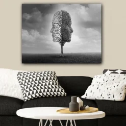 Canvastavla 70x100 cm - Stiliserad trädkonstruktion som formar en ansiktsprofil i svart och vitt